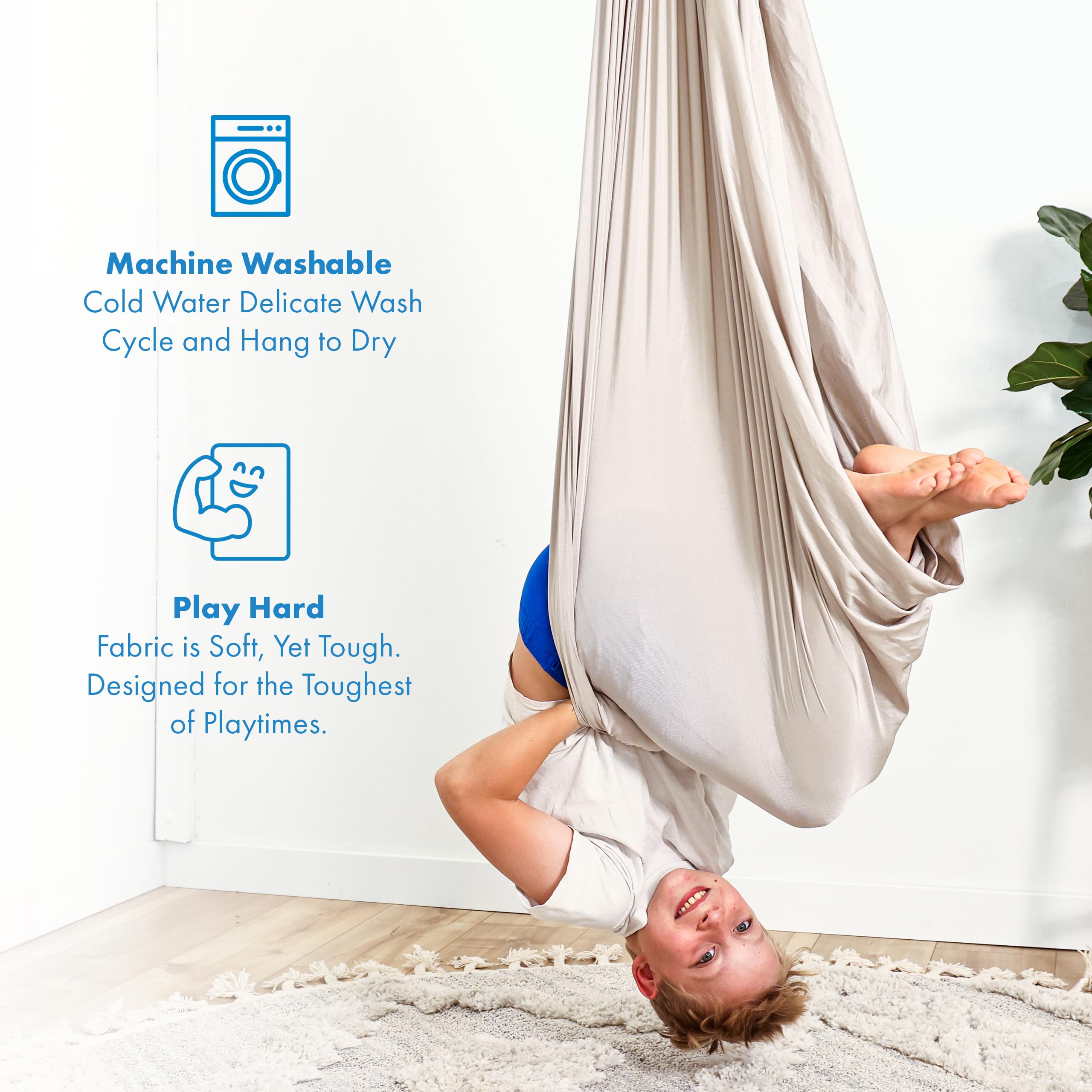 Adult in Harkla sensory swing showing sturdy 300 lb capacity and comfort