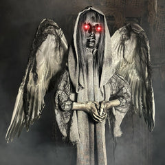 Haunted Hill Farm angel glowing red eyes lit for nighttime scare and visual impact