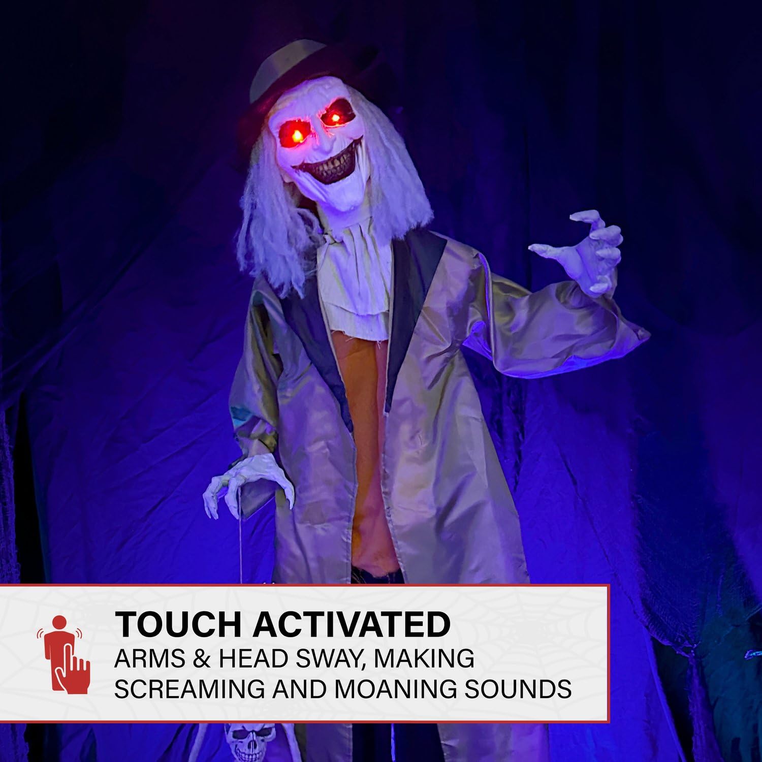 Haunted Hill Farm Jebediah lit at night with red eyes and shadow effects
