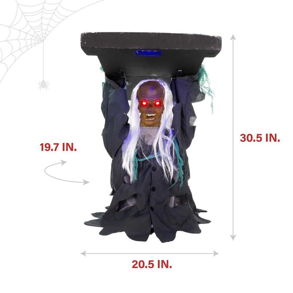 Haunted Hill Farm moving arm lifting the tombstone demonstrating dynamic motion and impact