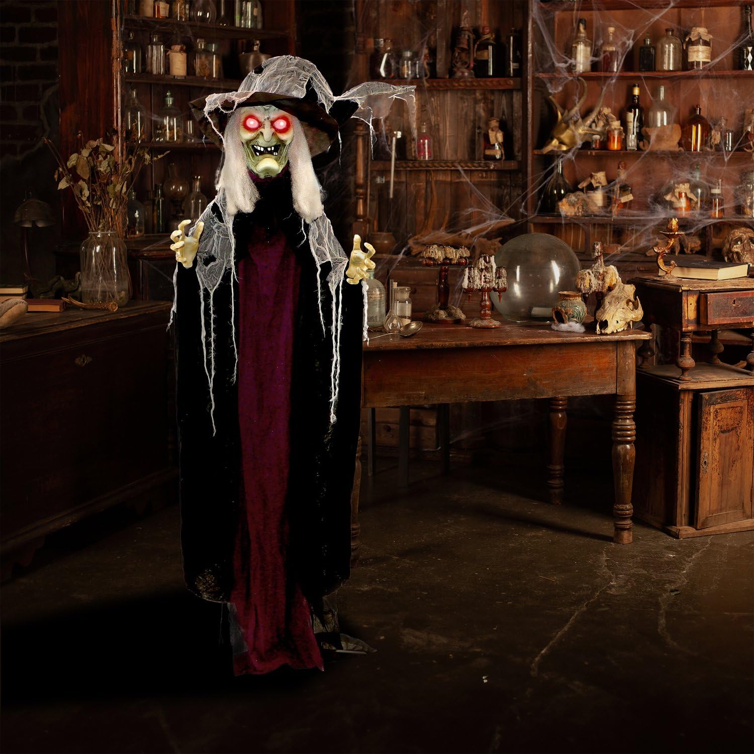 Haunted Hill Farm witch poseable arms detail shows adjustable display options