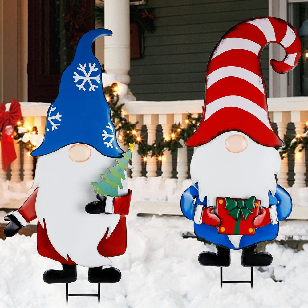 Hausse gnome stakes beside a ruler showing 33-inch height for scale and placement planning