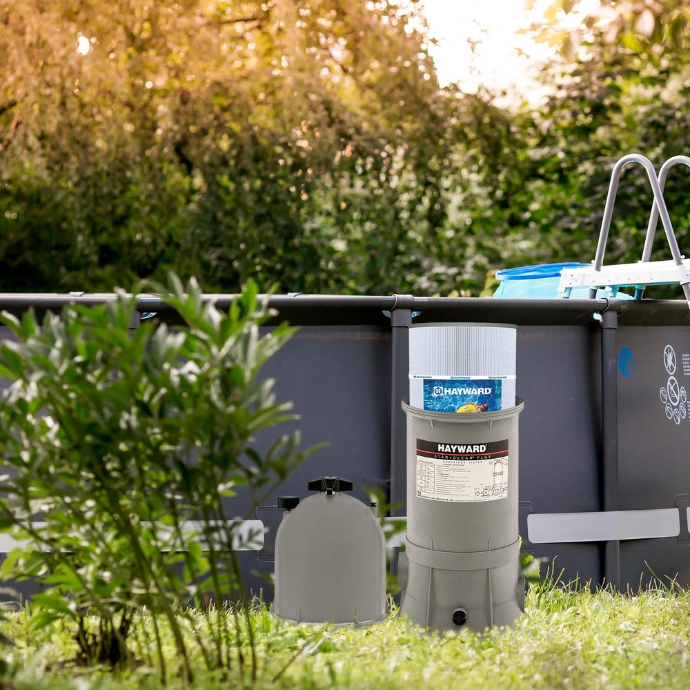 Hayward cartridge displayed near pool conveying compatibility with pool systems benefit