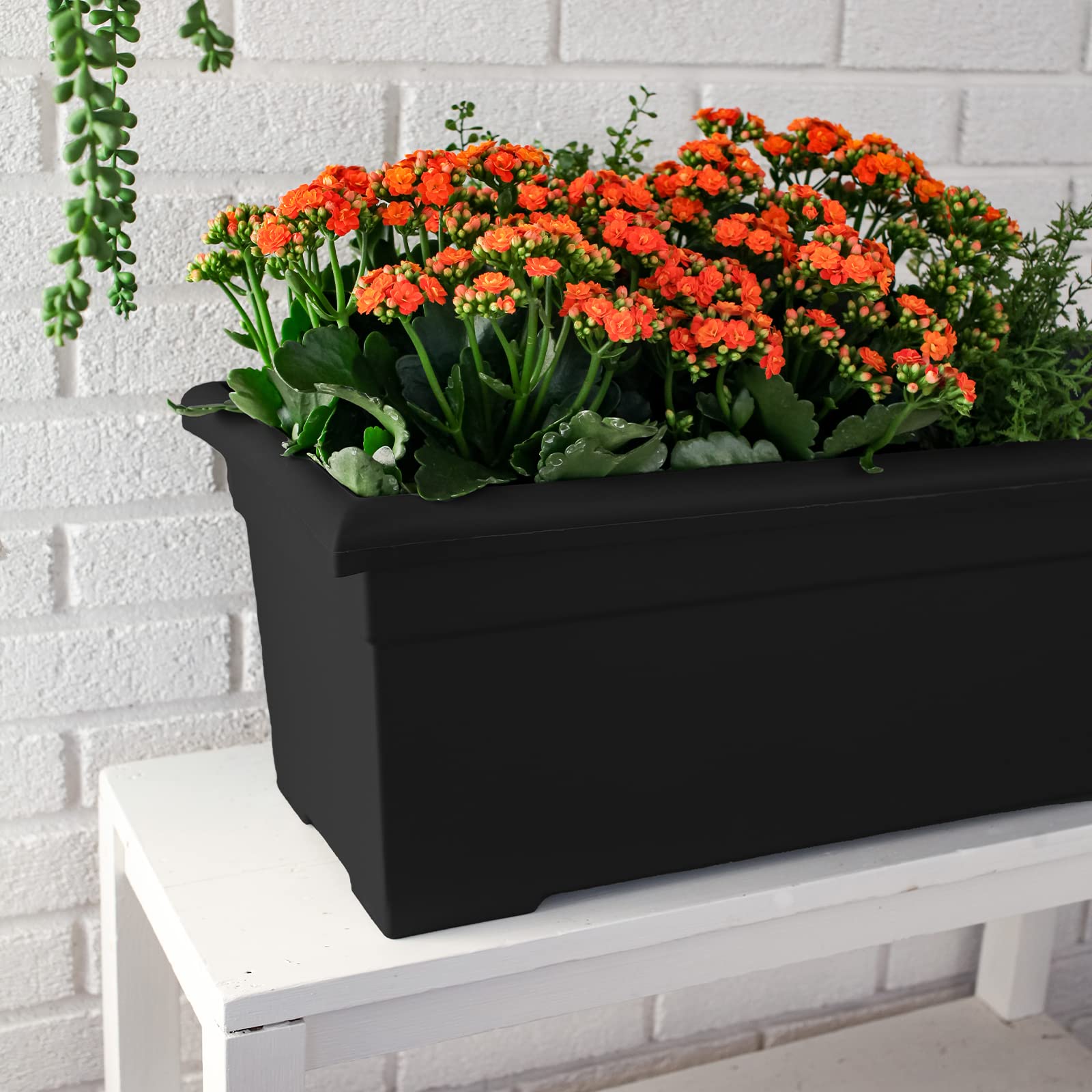 The HC Companies Romana close-up of removable drainage plug providing controlled water release