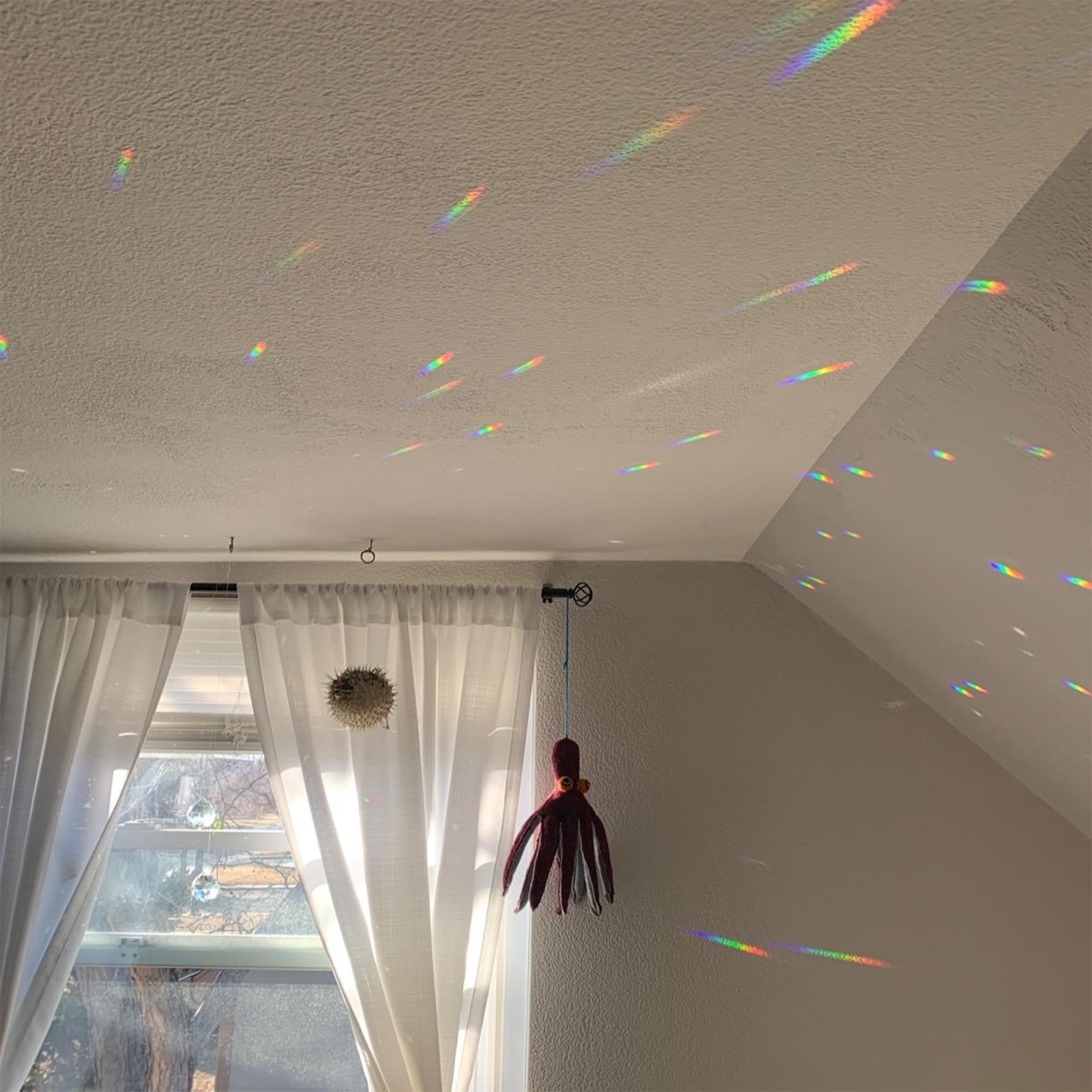 HDCRYSTALGIFTS prism held in hand to show scale and installation ease