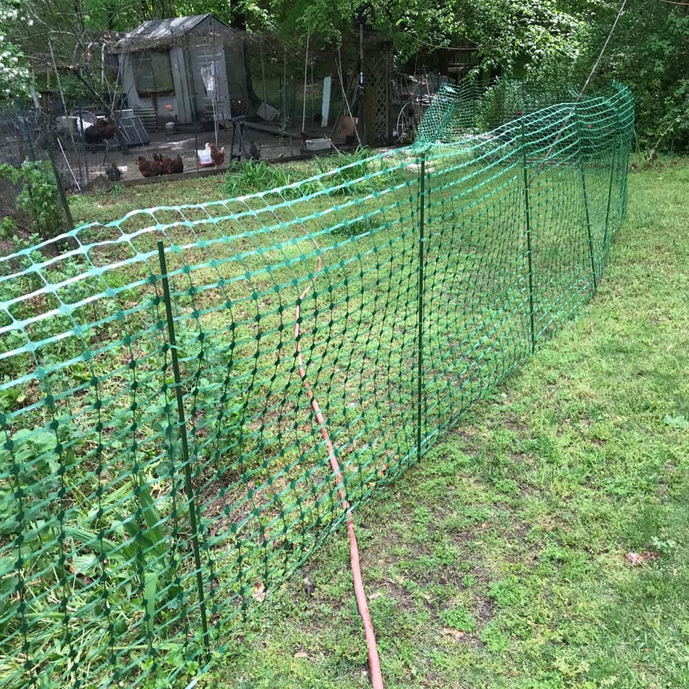 Hdeoops stakes beside a ruler illustrating 57-inch length and scale