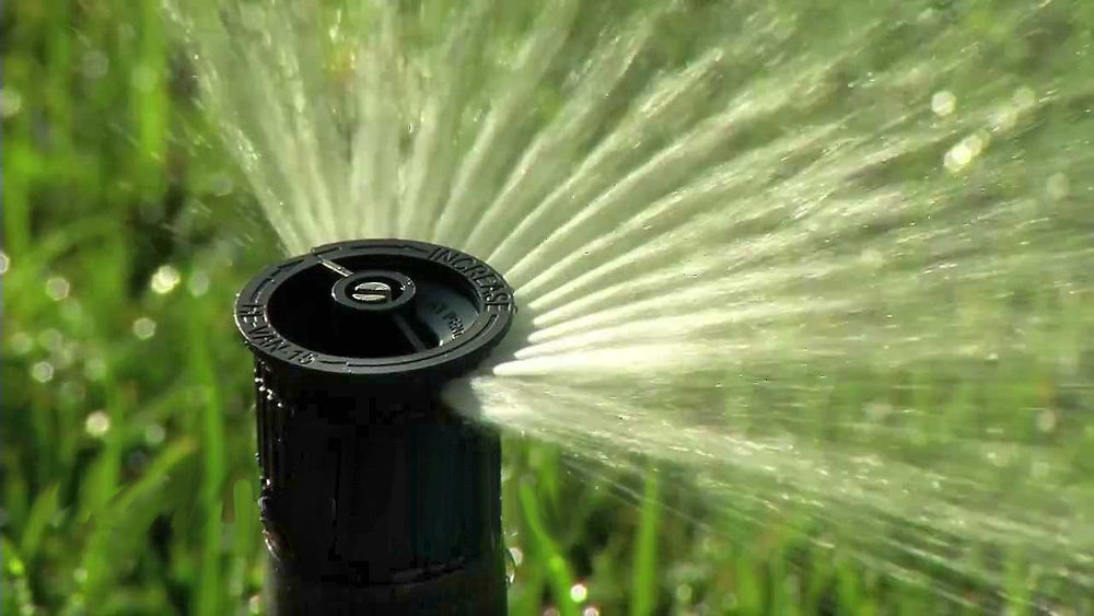 HE-VAN-15 front view of 25-pack nozzles showing included screens and compact design for efficient watering