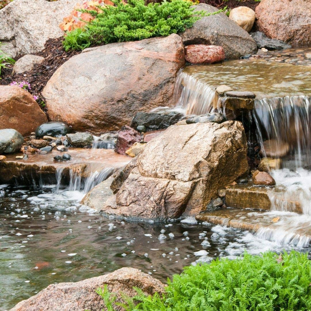 Healthy Ponds dissolving packet in pond water illustrating fast release of bacteria