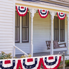 Heartome pleated fan flag mounted on porch railing adding festive Fourth of July charm
