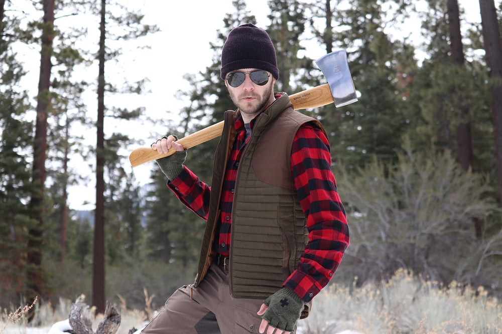 1844 Helko Werk Forester leaning by cabin illustrating rugged outdoor readiness
