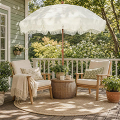 HERA'S PALACE fringe umbrella front view showing clean white canopy and wide shade