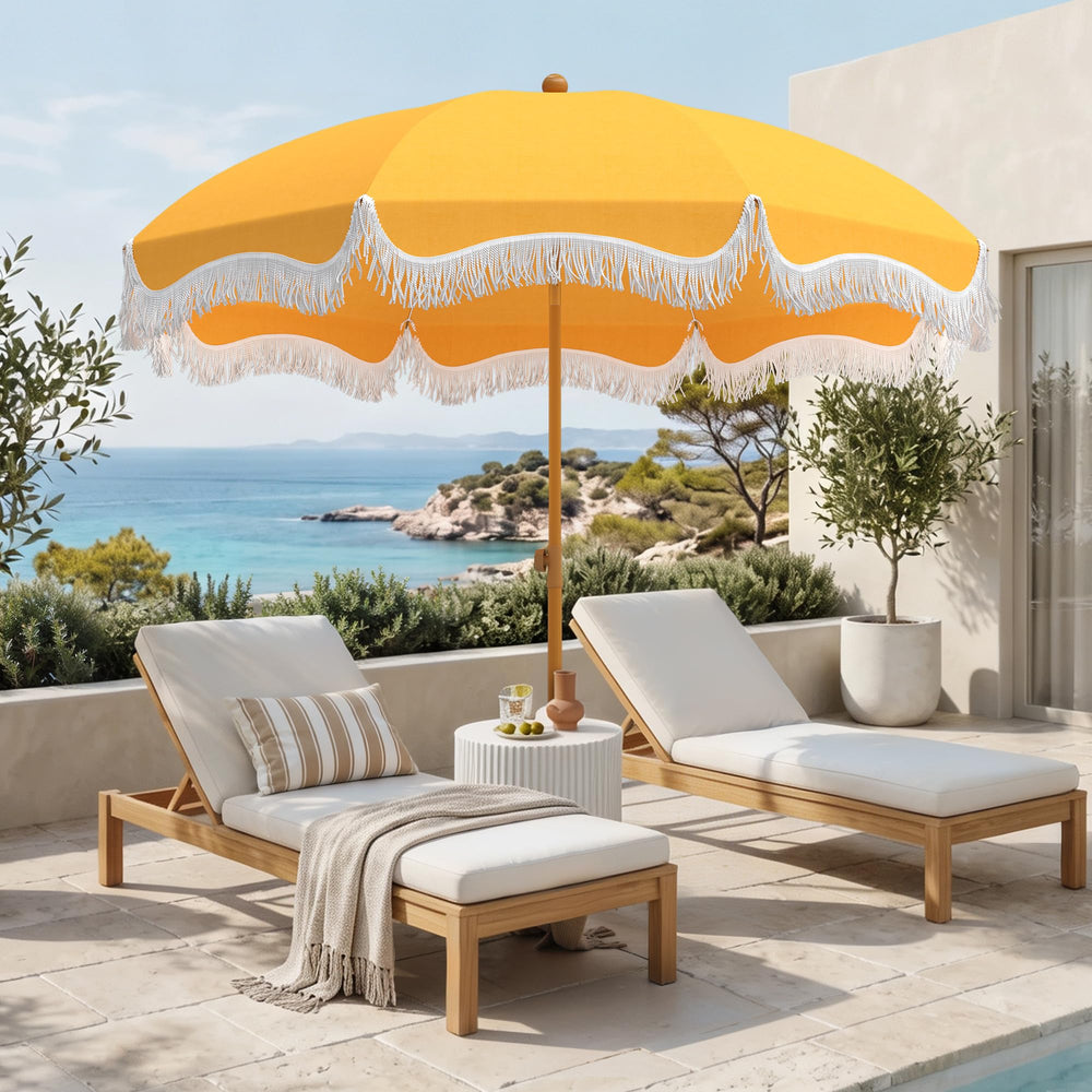 HERA'S PALACE front view gold yellow umbrella showing bright shade