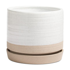 HERDUK 8 inch planter front view showing matte white beige finish and saucer, clean modern look