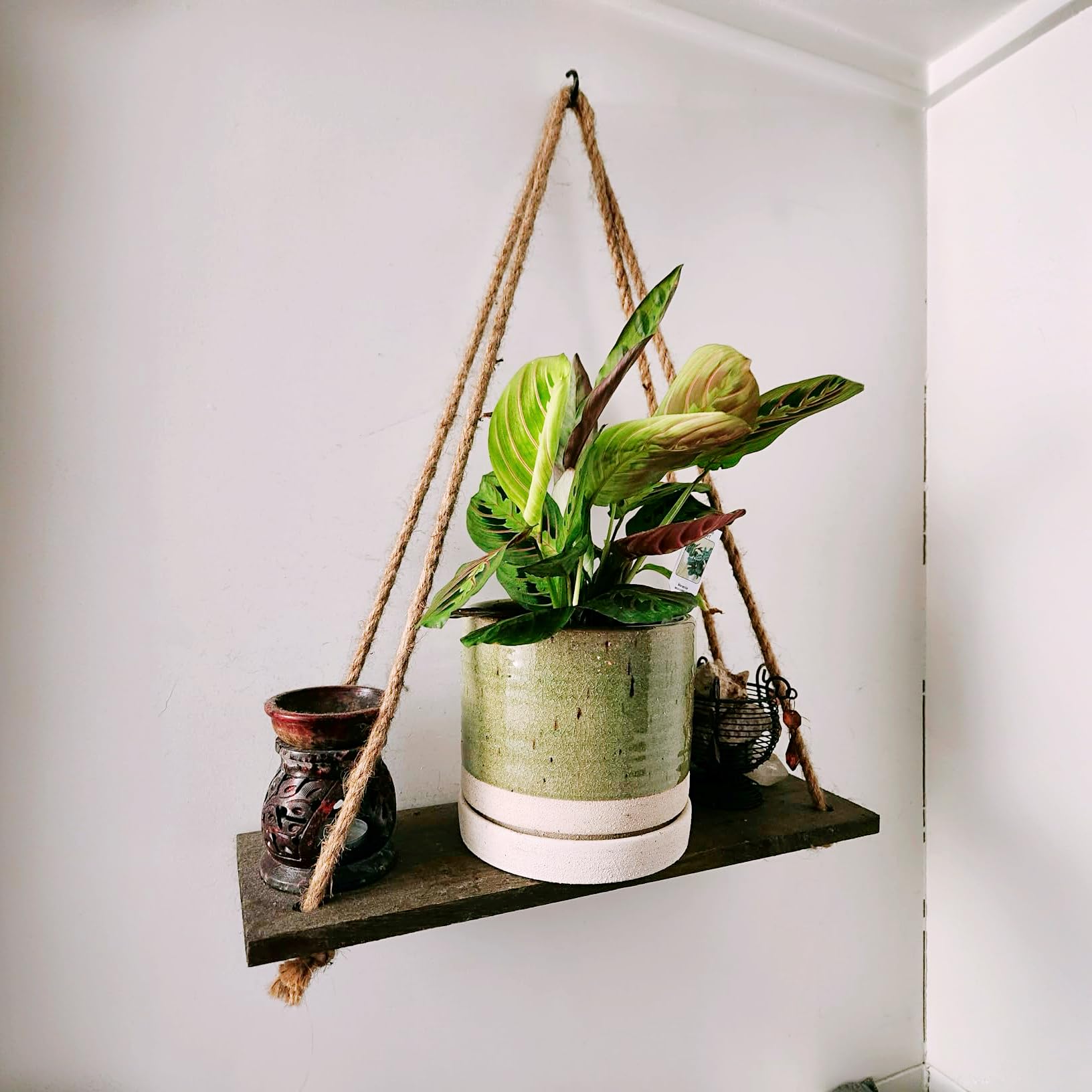 HERDUK planter in patio scene adding decorative charm and outdoor durability