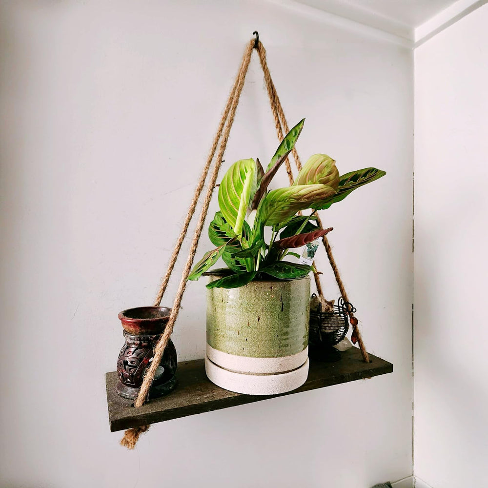 HERDUK planter in patio scene adding decorative charm and outdoor durability