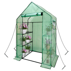 heyfurni front view showing full walk-in greenhouse protecting plants outdoors