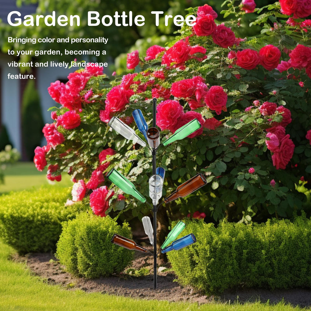 HEYTIMI bottle tree with illuminated bottles at evening event creating ambient outdoor lighting