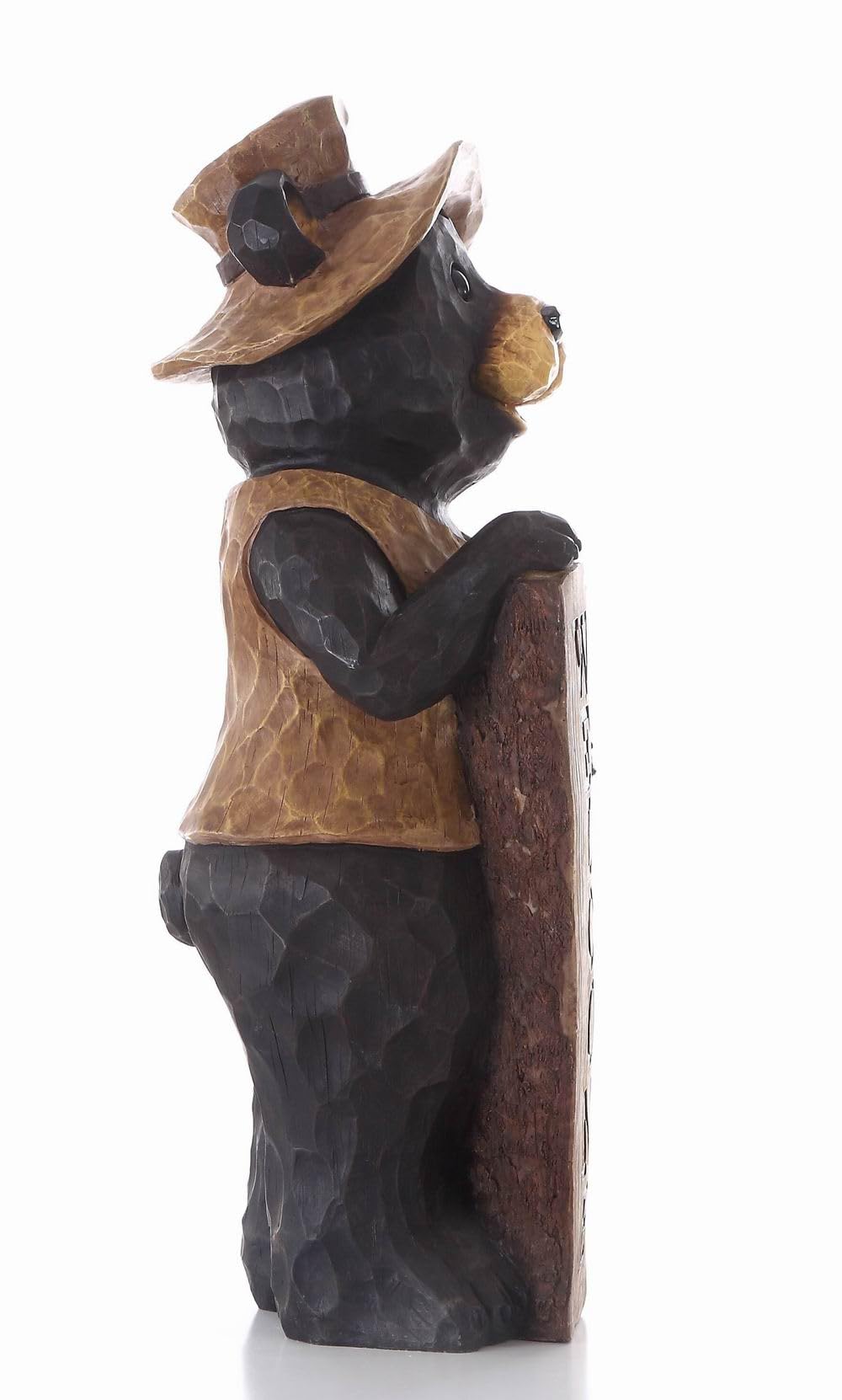 HI-LINE bear among plants serving as charming garden accent