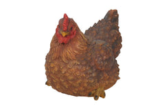 HI-LINE squatting hen front view showing lifelike pose and rustic charm