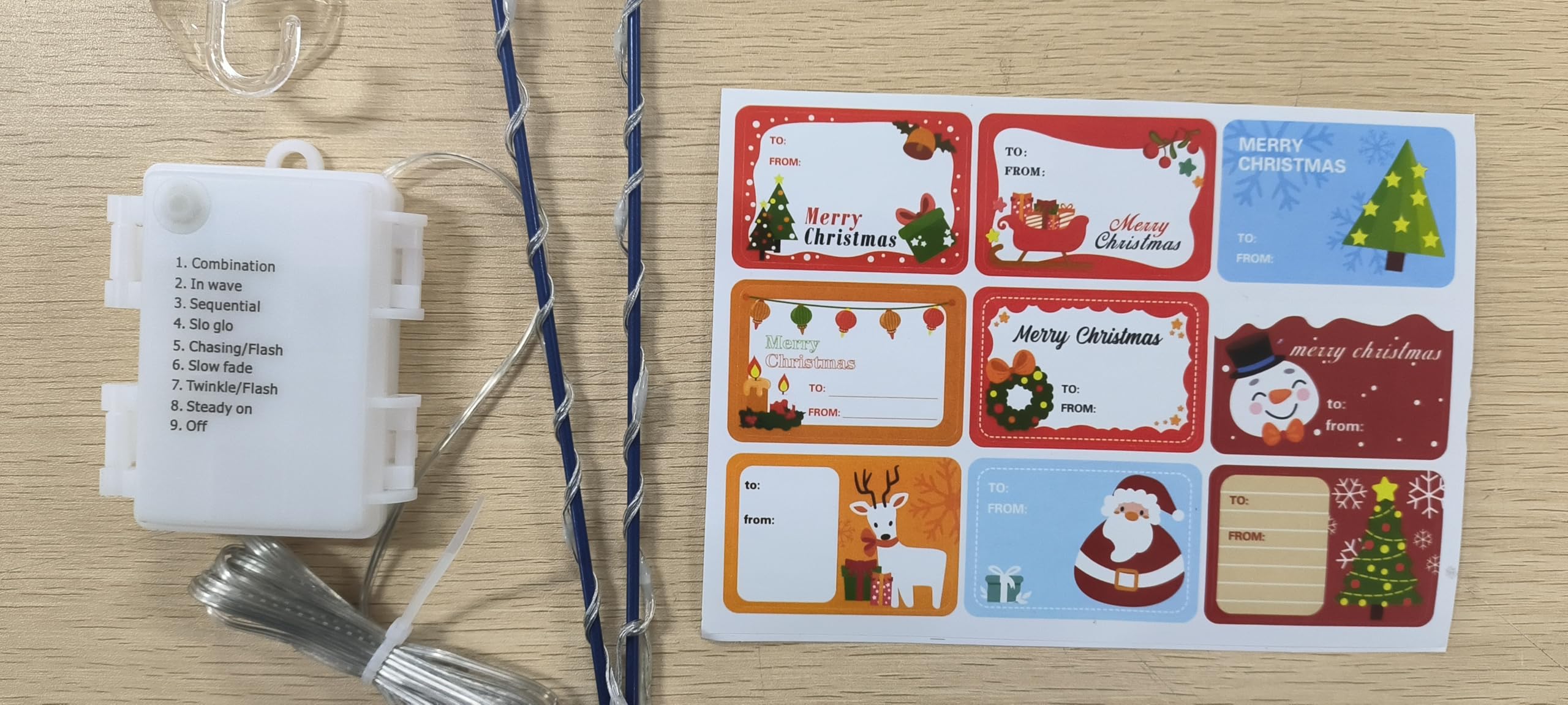 Hiboom foil stickers and transparent hook detail showing decorative additions and easy hanging