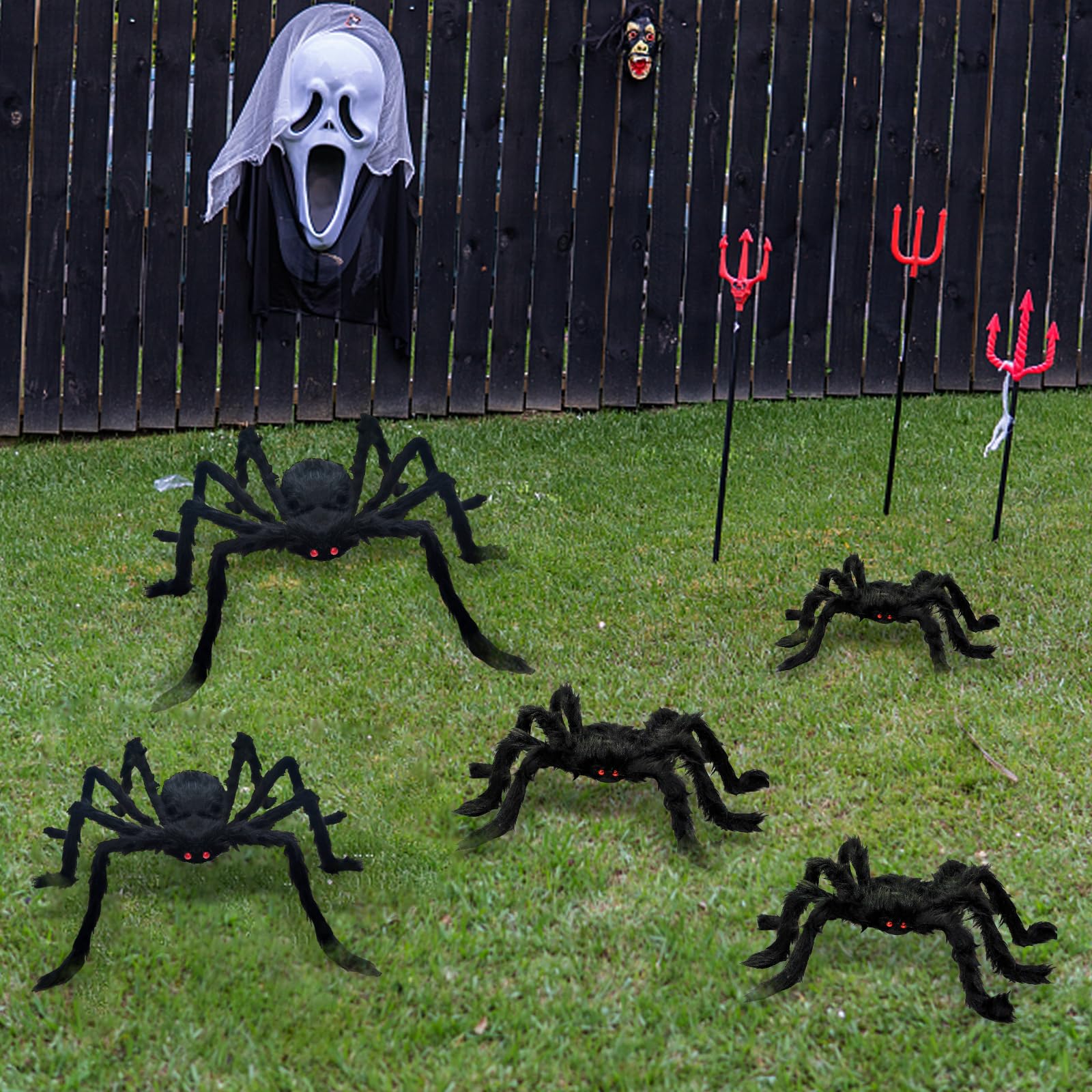 Hidreamz spiders arranged in a yard at night with red eyes for an atmospheric Halloween display
