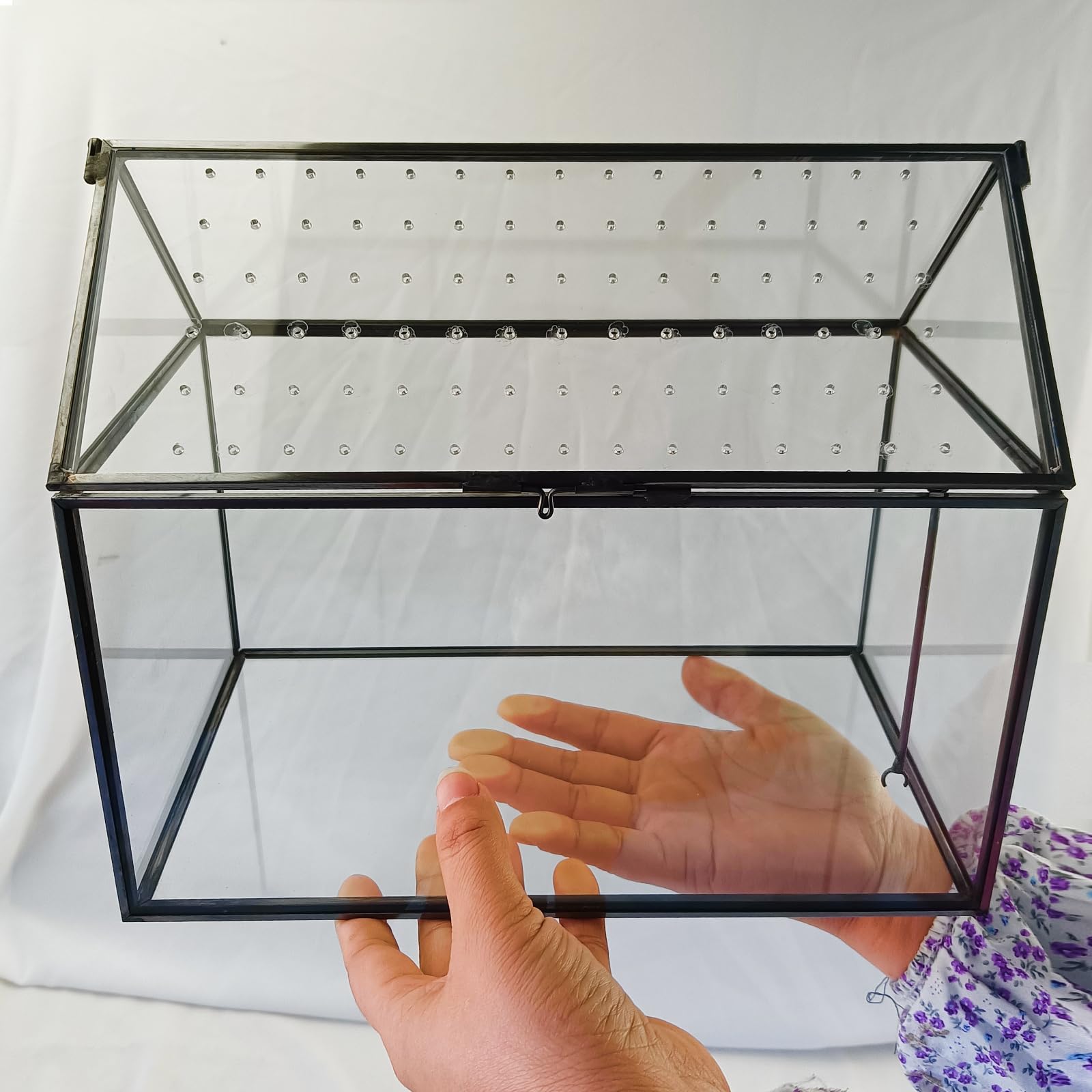 HighFree close-up of black metal frame welds highlighting durable construction