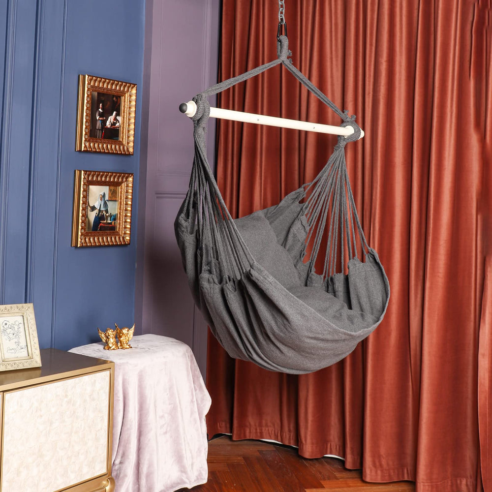 Highwild hammock chair attached with carabiner showing quick, secure installation