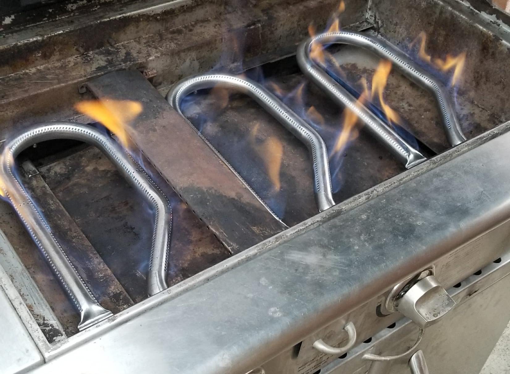 Hipoilk lifestyle shot of grill in backyard demonstrating improved cooking performance after replacement