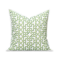 Hofdeco Premium front view showing coastal grass green fretwork print and flanged border benefit: adds refined style