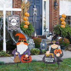 hogardeck stakes placed in garden bed creating whimsical seasonal focal point