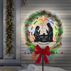 Hokfirm front view nativity stake showing silhouette and holly accent, festive curb appeal