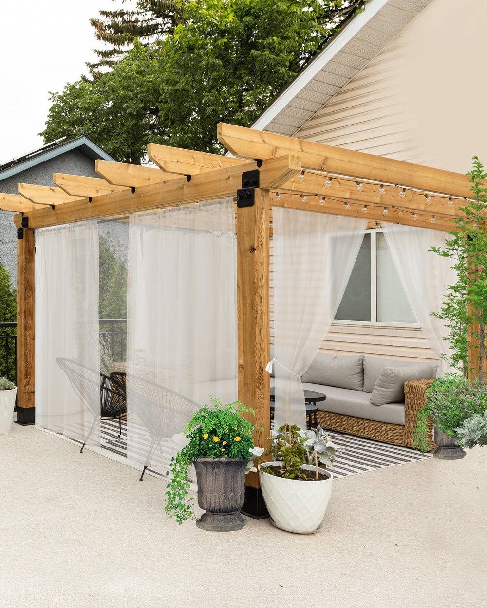 HolidayIdeas front view of six beige outdoor sheer curtain panels showcasing package benefit