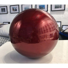 HomDSim red globe close-up of painted mirror surface highlighting shine