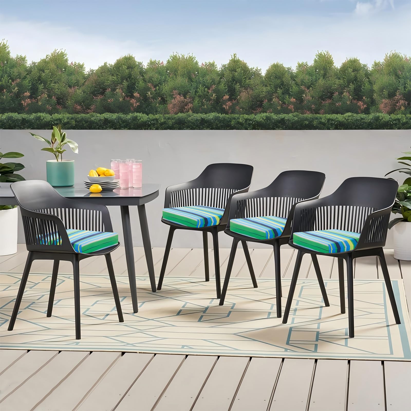 HOMELYSIAN cushions styled on a patio set showing coordinated look and year-round outdoor appeal benefit
