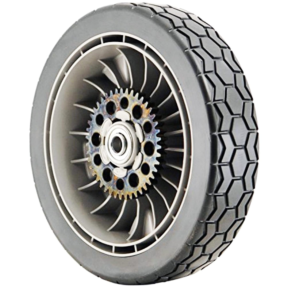 Honda rear drive wheel beside ruler showing correct dimensions for fit