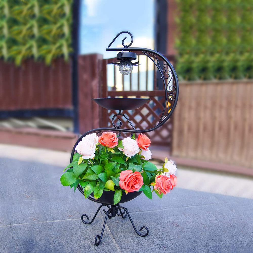 HONGLAND planter filled with flowers on bird bath showing decorative planting and benefit: attracts pollinators
