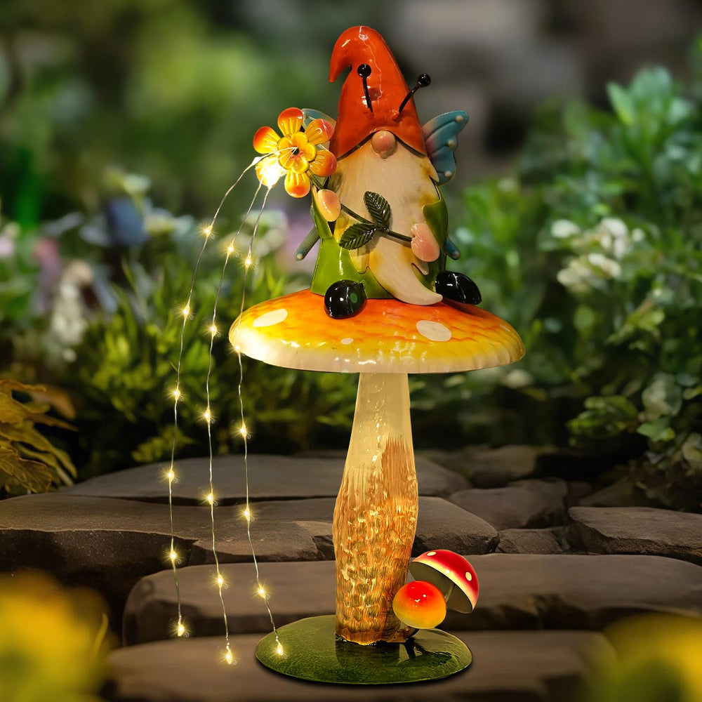 HONGLAND gnome in flower bed showing decorative blend with plants