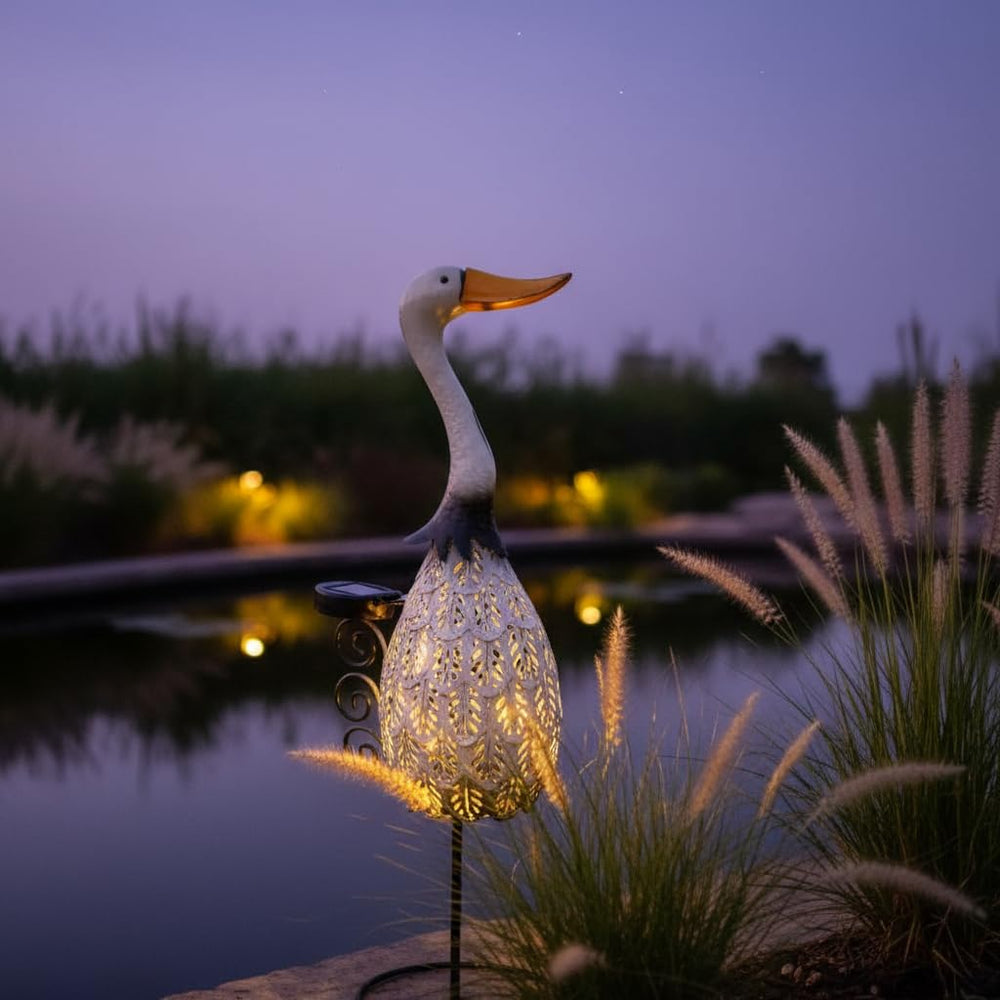 HONGLAND goose staged in garden adding elegant focal interest