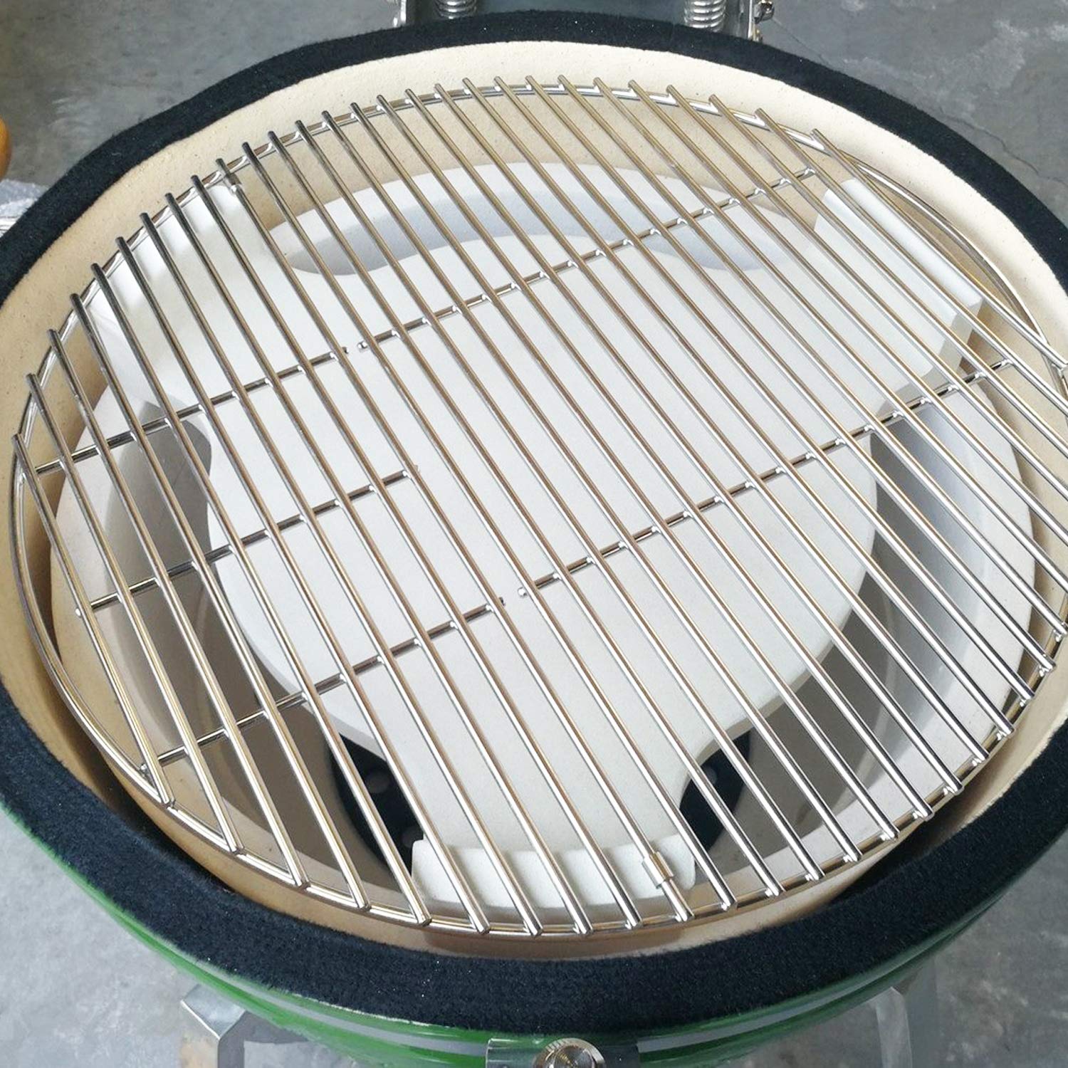Hongso plate setter in a backyard kamado grill scene for outdoor cooking inspiration