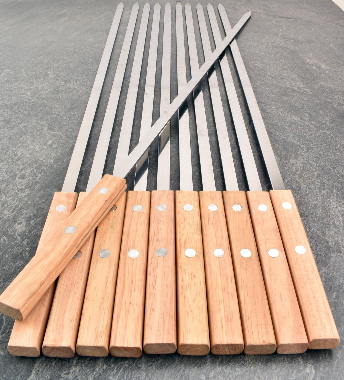 HONSHEN front view of 12-skewer set showing stainless blades and hardwood handles for durable grilling