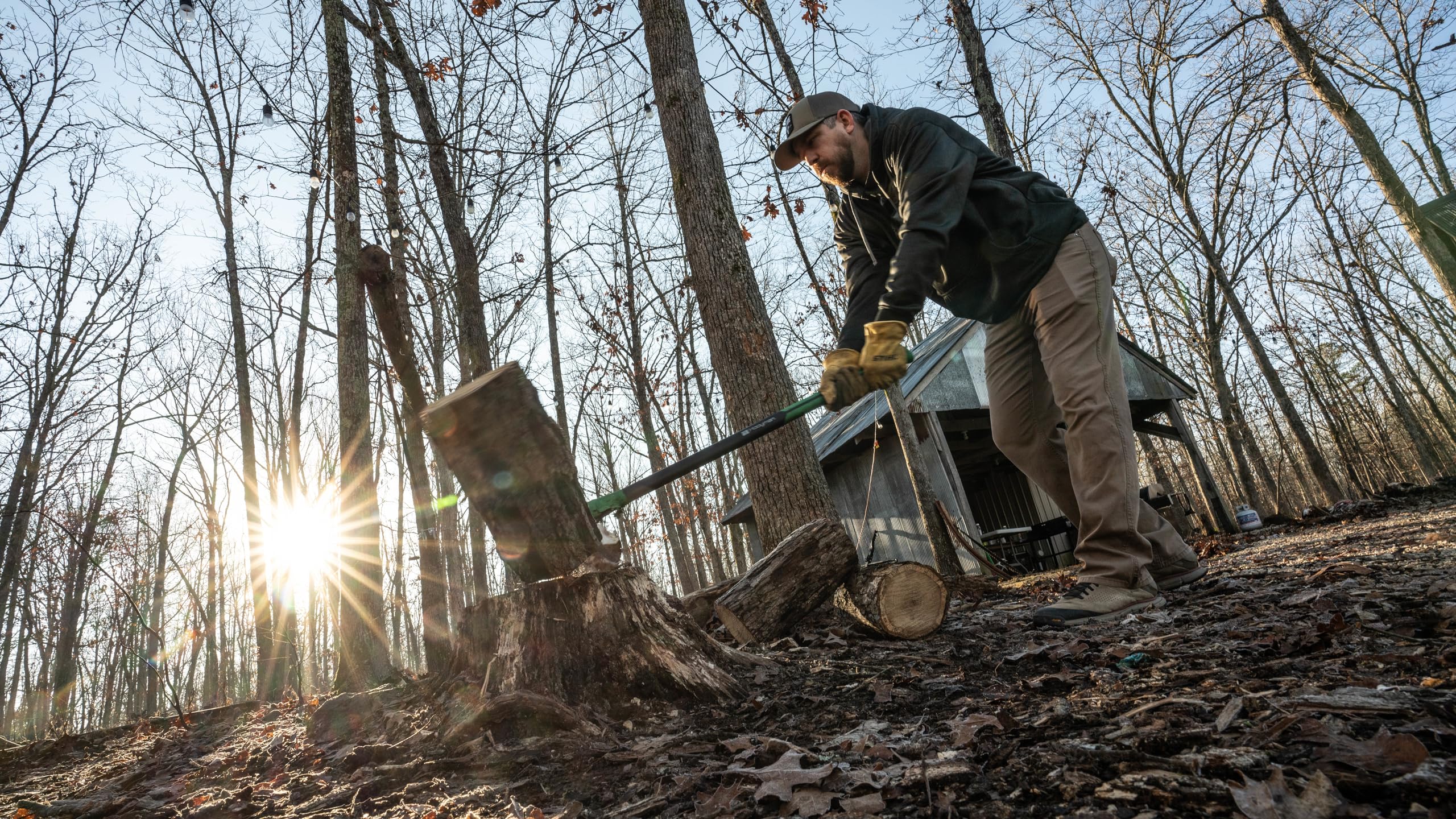 Hooyman maul splitting a log in use demonstrating efficiency and power