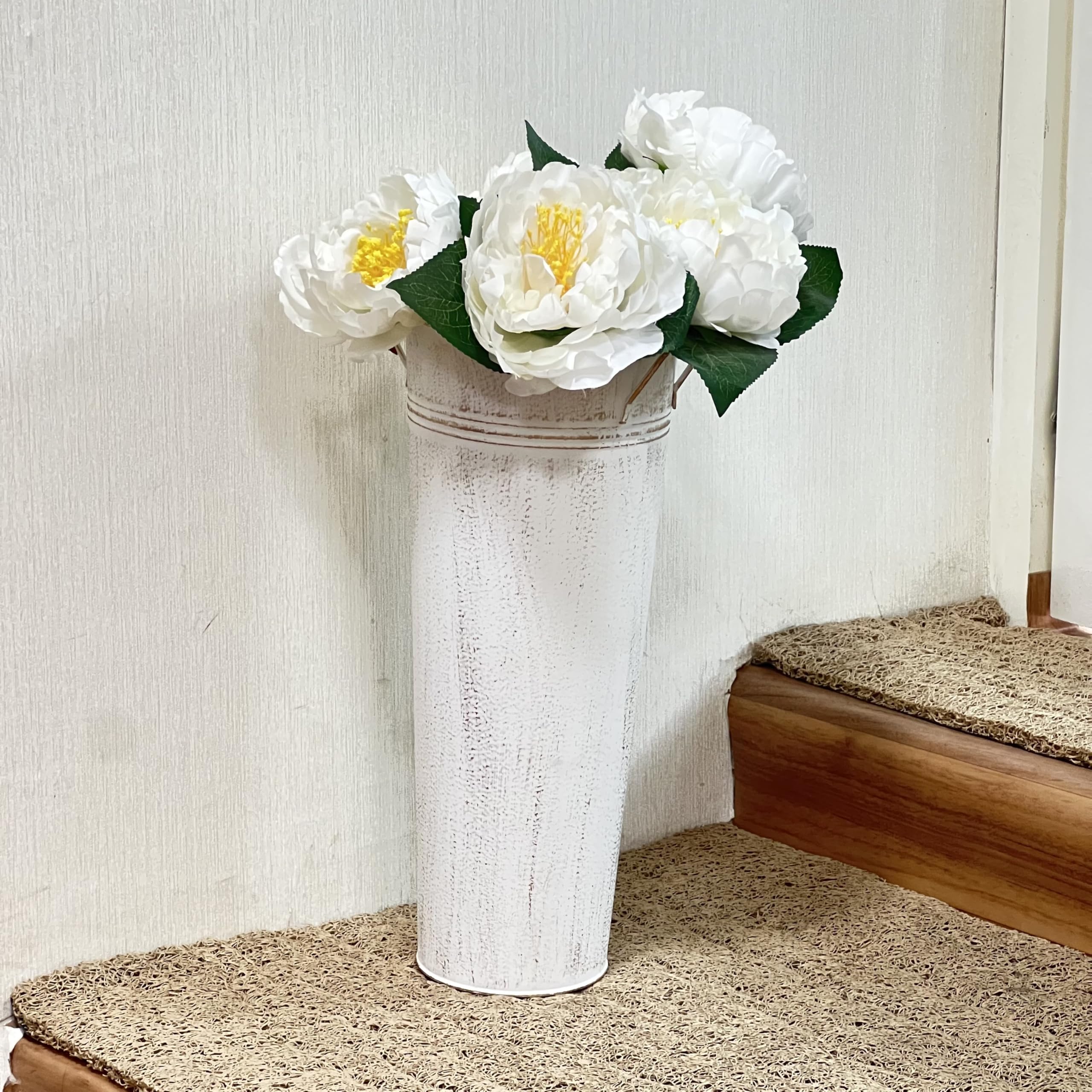 Hosley arranged on a rustic table creating coordinated event decor