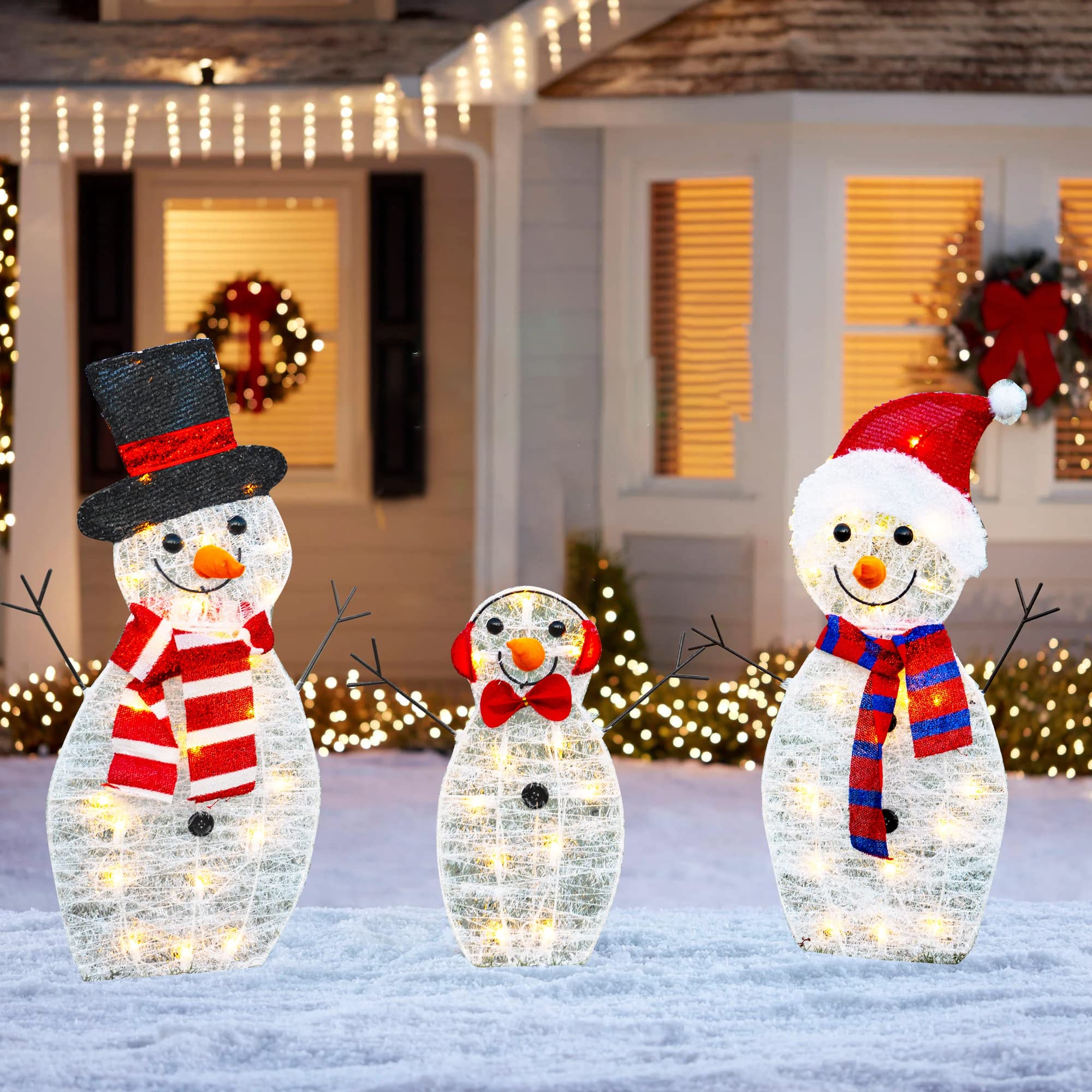 HOURLEEY front view of three snowmen family showing festive curb appeal