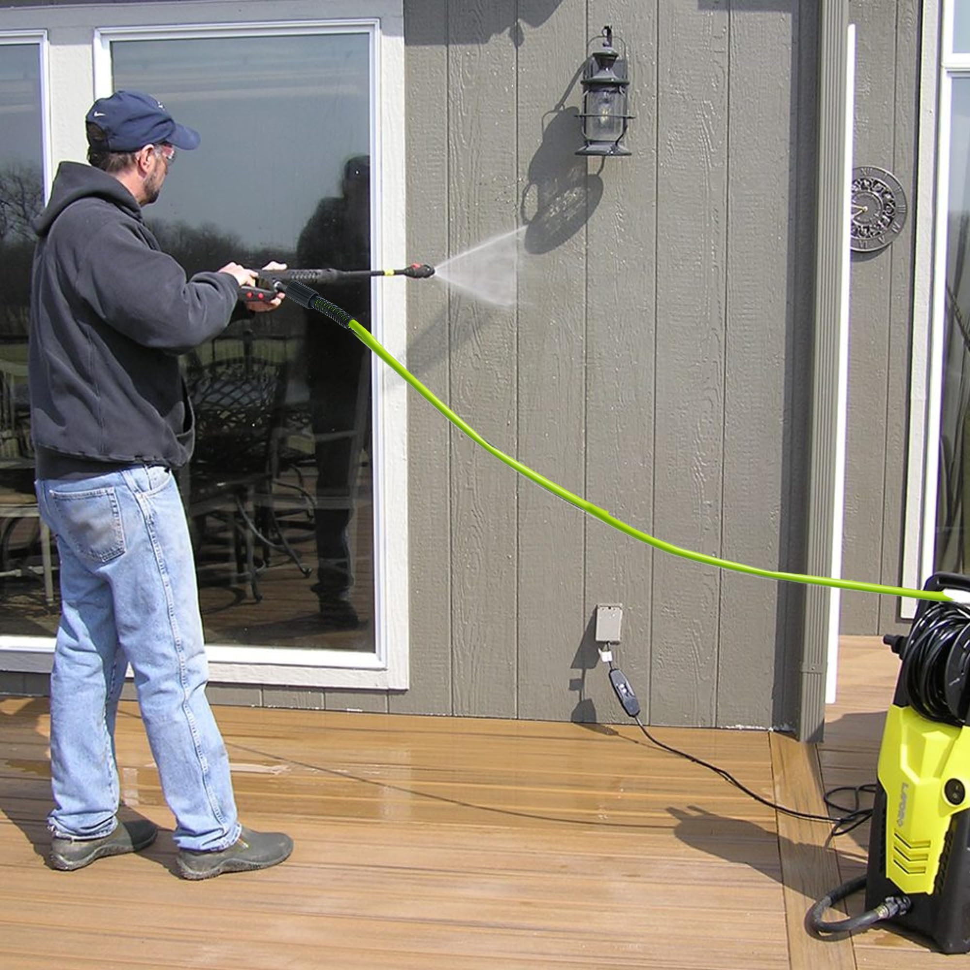 Hourleey hose next to tape measure showing accurate 50ft length benefit