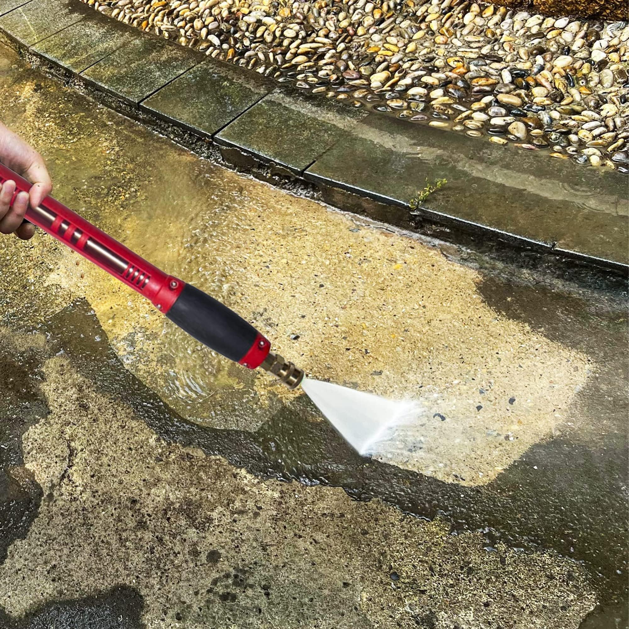 Hourleey washer gun in use cleaning siding demonstrating powerful coverage