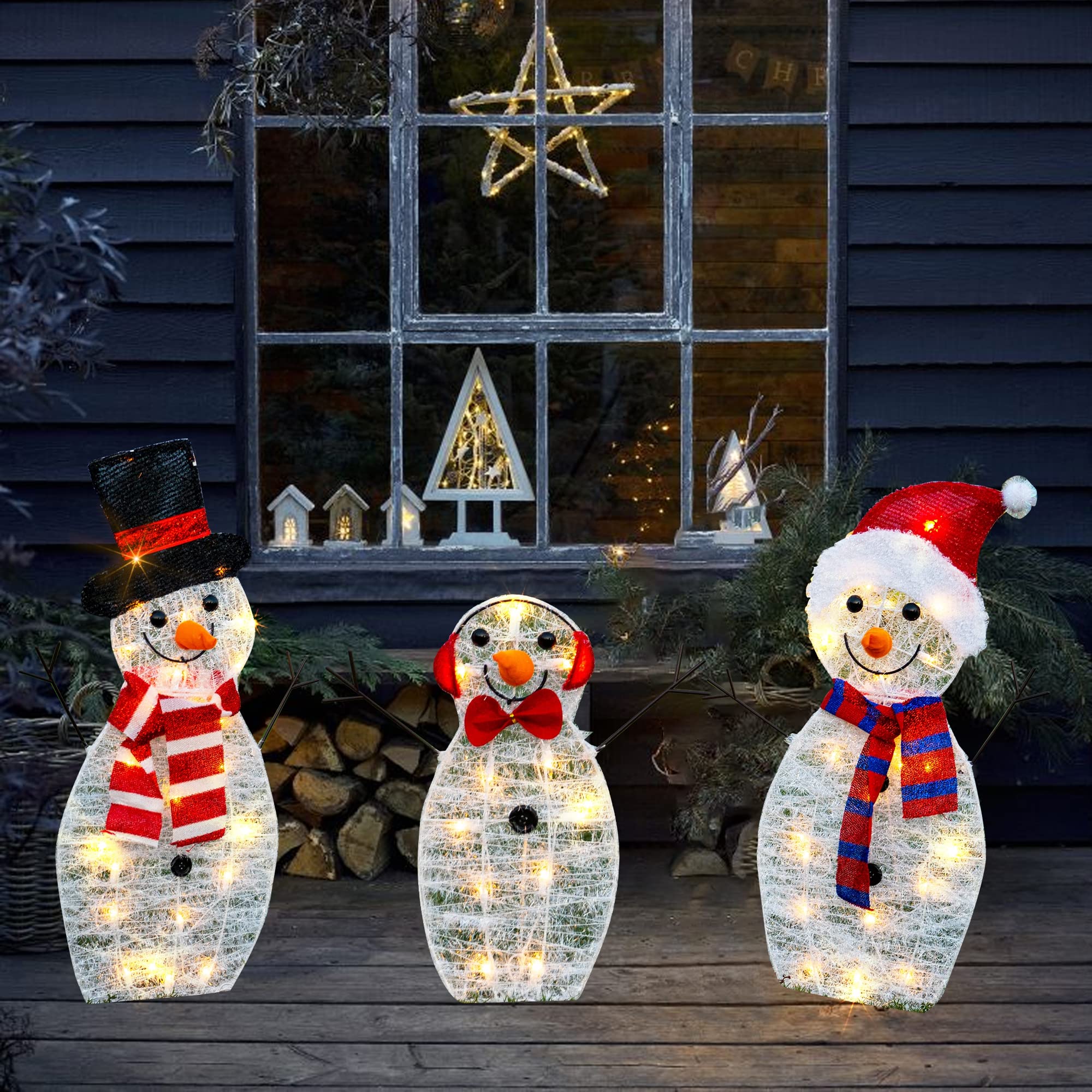 HOURLEEY nighttime yard display with warm lights creating welcoming ambiance