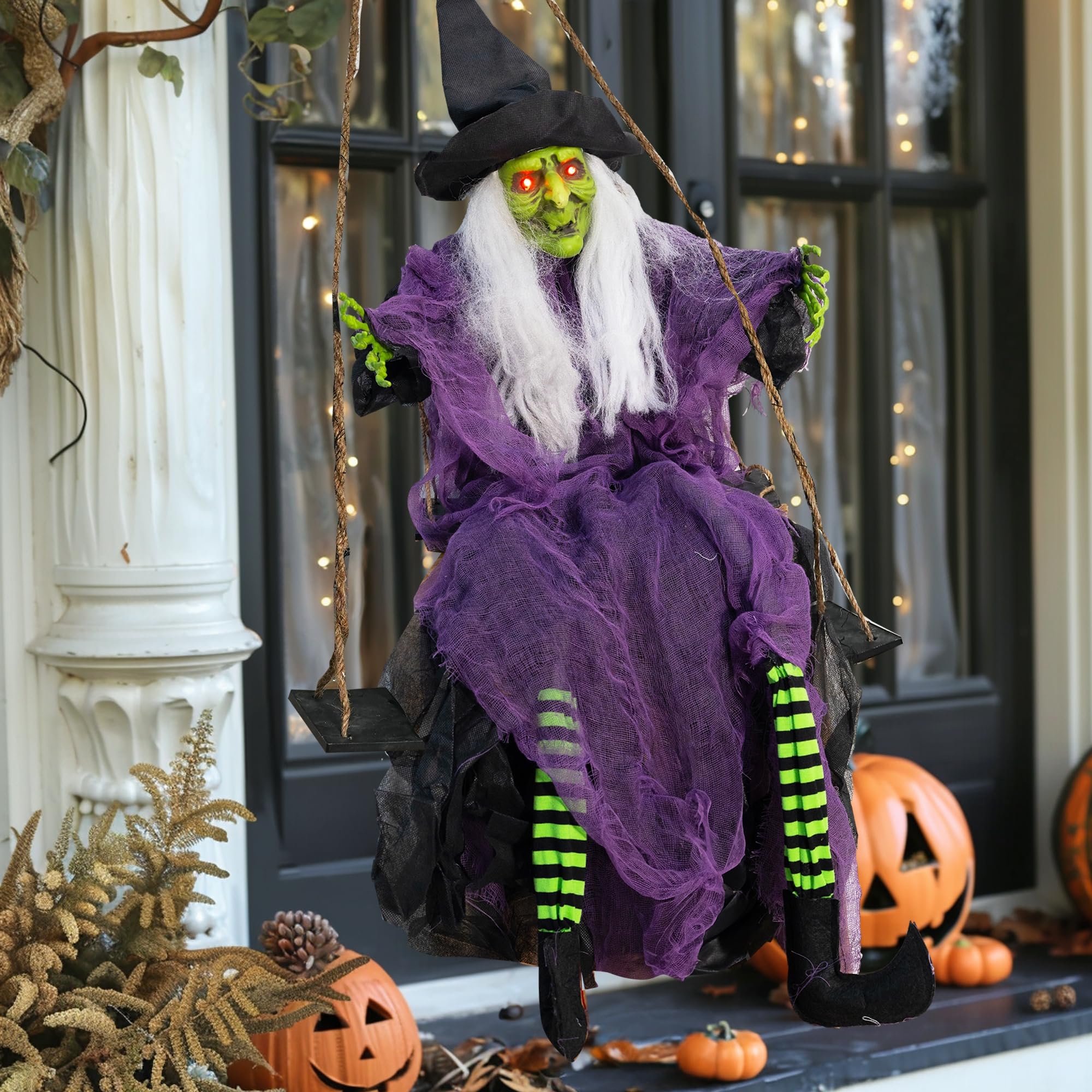 Hourleey porch scene with both props installed showing haunted-house ambiance