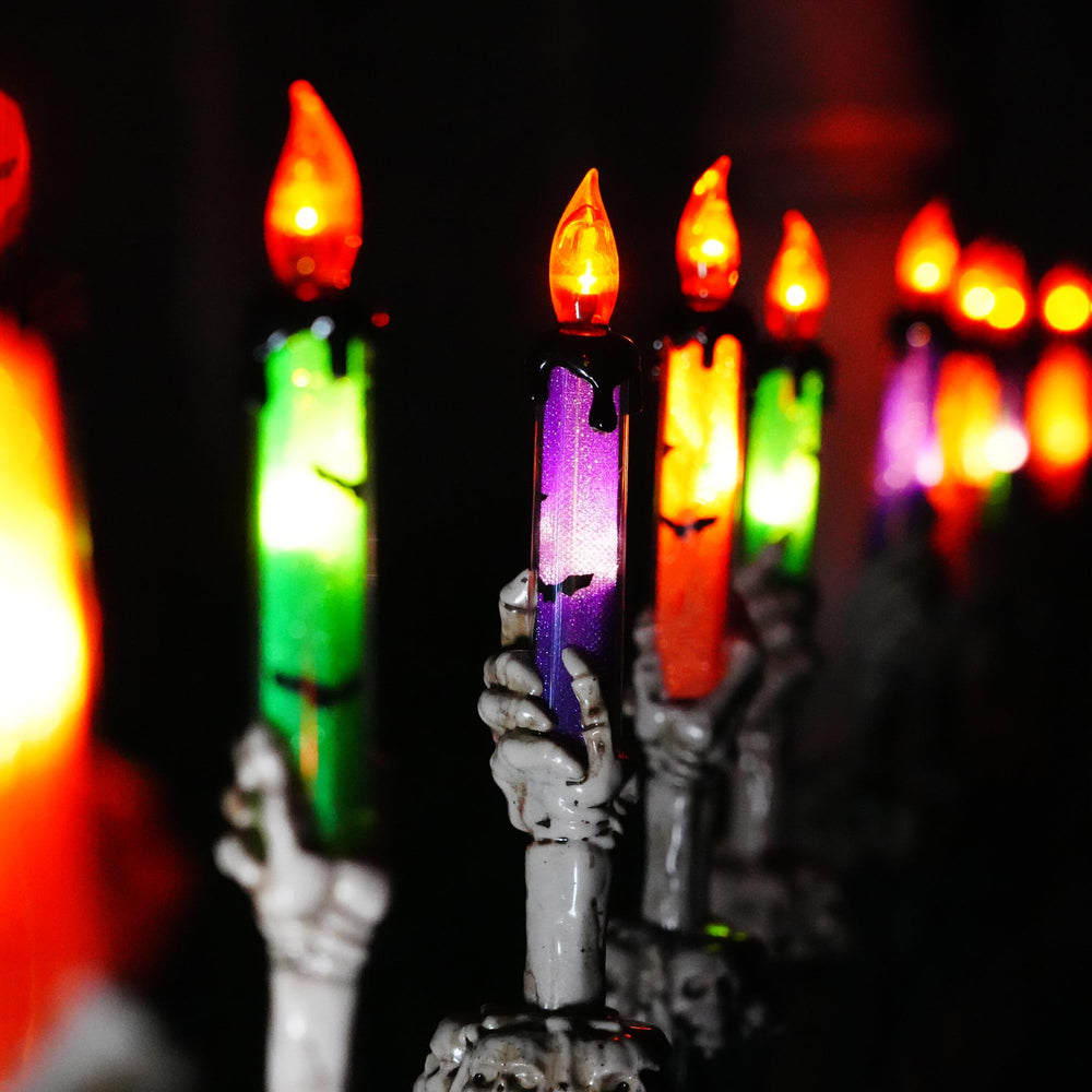 Hourleey porch scene with multiple skull lights creating festive ambiance benefit