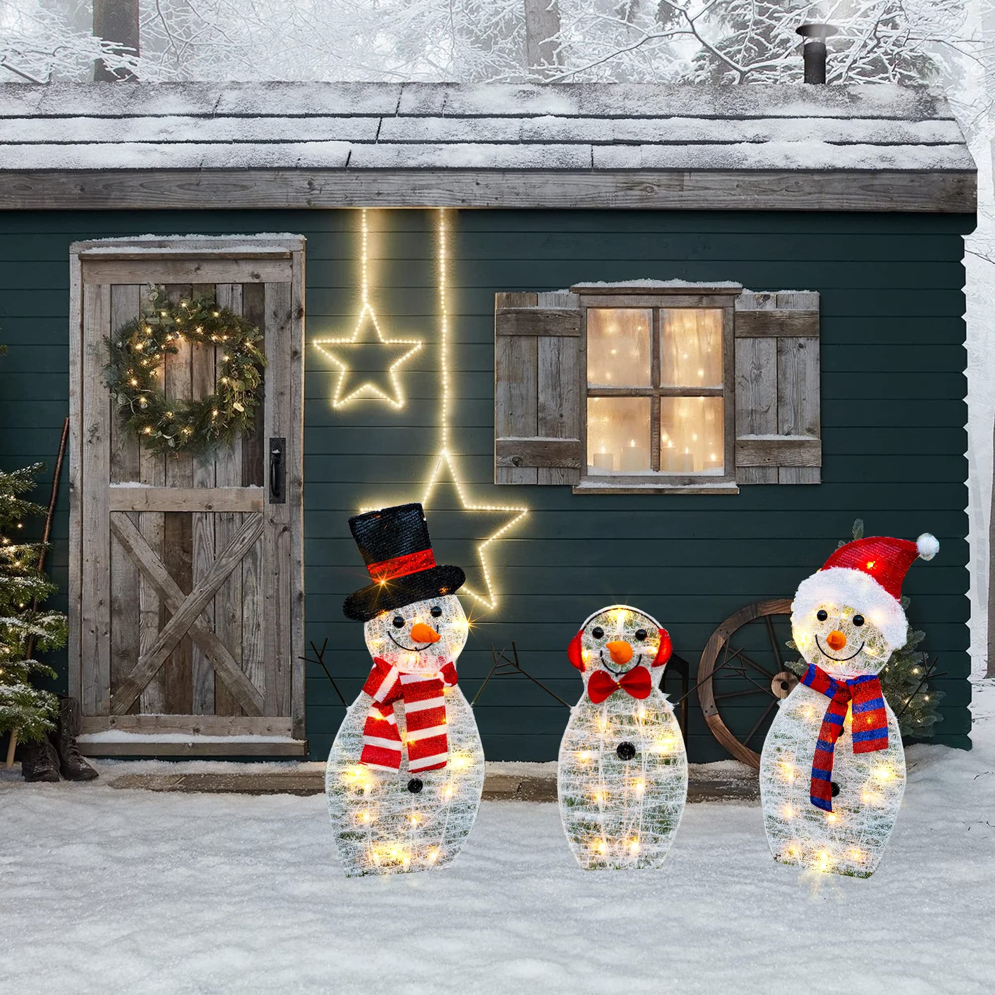 HOURLEEY snowman set beside person showing scale and yard fit