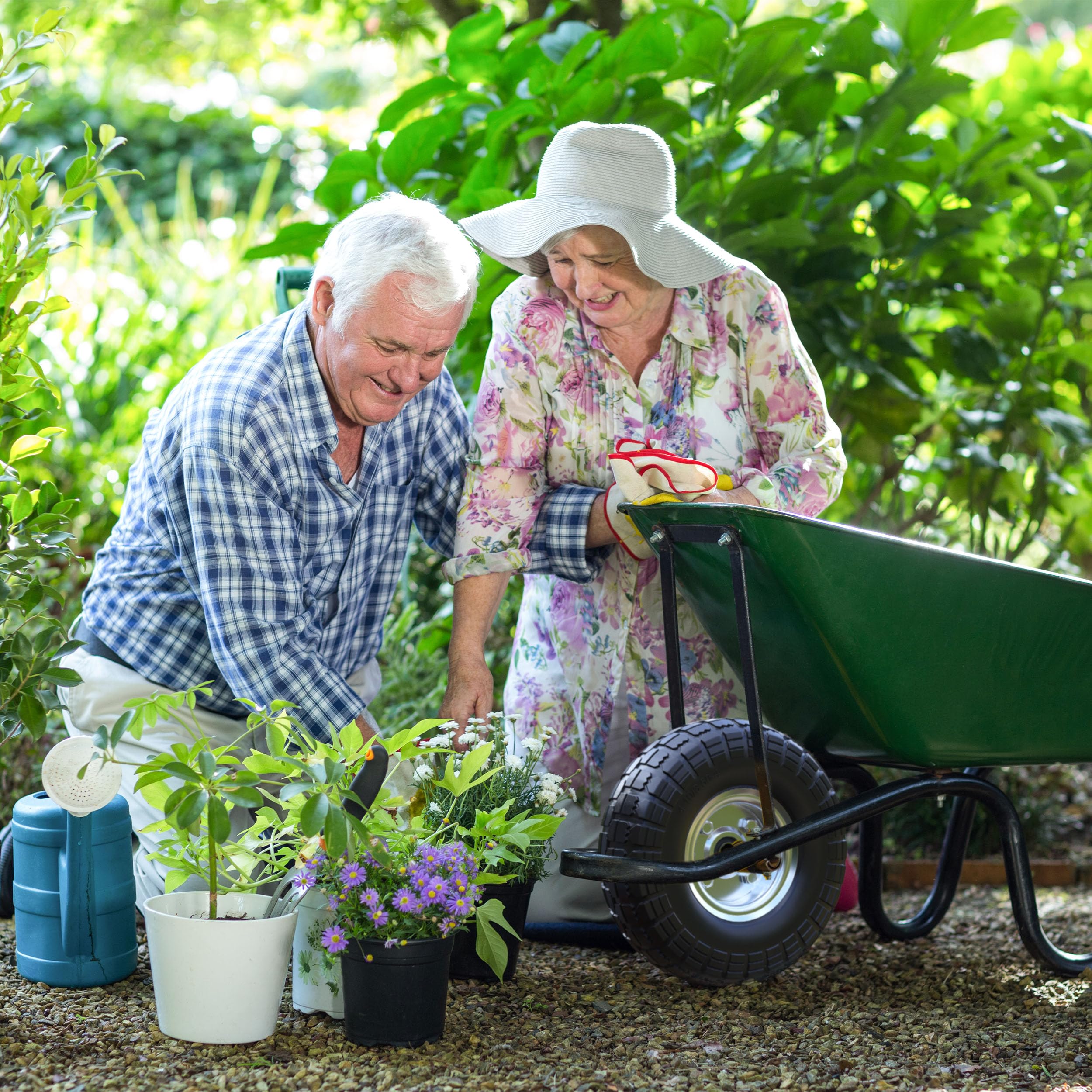 Houseables wheel in yard and jobsite lifestyle photo highlighting reliability during landscaping tasks